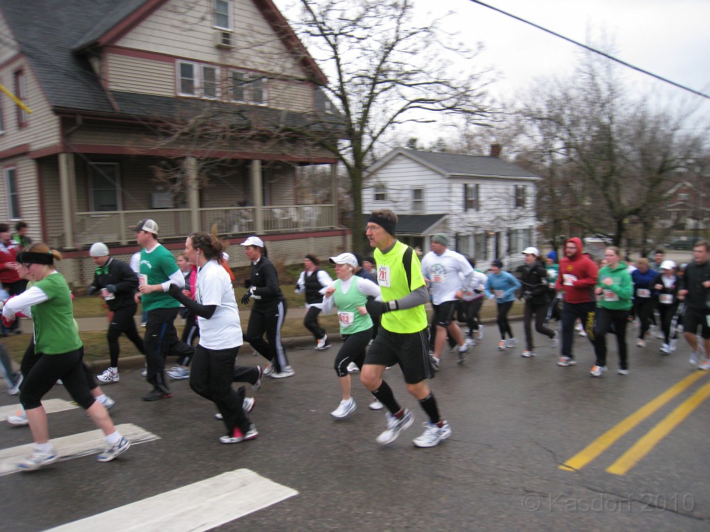 Shamrocks and Shenanigans 5K 2010 0690.jpg - The 2010 Shamrocks and Shenanigans 5K race in Ann Arbor MI. Cool and damp, and crowded. Just a few more steps and I summit!! This thing must be only a few feet less than Mt. McKinley.